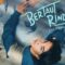 Poster Film Bertaut Rindu Menampilkan Magnus Dan Jovanka Duduk Saling Berhadapan Dengan Latar Karya Seni Mereka